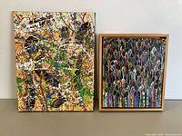 Two small abstract paintings displayed side by side on a wall.