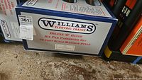 Box front showing Williams Electric Trains Deluxe 'O' Gauge six car passenger set
