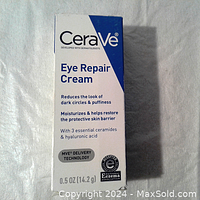 Box front showing product name and features including reduction of dark circles and puffiness, moisturizing, 3 essential ceramides and hyaluronic acid, 0.5 oz (14.2 g)