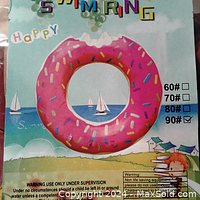 Photo of the packaging showing a pink donut-shaped swimming ring with sprinkles and a cartoon beach background, size 90# selected.