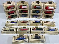View of 22 Chevron Commemorative Model Trucks, all in original beige display boxes with clear windows, stacked in multiple rows showing different truck models and colors.