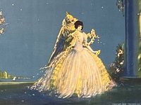 Close up of artwork depicting a couple in a dreamy night setting with blue background and soft lighting on figures.