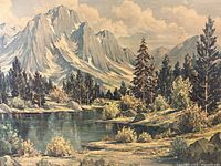 Close-up of the printed landscape artwork depicting mountains, lake, pine trees, and sky.