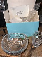 Two Tiffany & Co crystal pieces: bowl with leaf etching and cut crystal vase with original box and paperwork