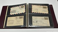 Four first flight covers in plastic sleeves in burgundy album, showing airmail envelopes with Canadian stamps and postmarks.