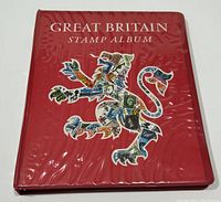 Cover of red Stanley Gibbons album with Great Britain Stamp Album title and collage lion motif
