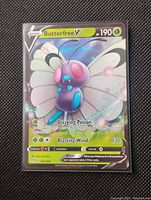 Front view of Butterfree V Full Art Holo Pokemon Card, showing detailed holographic butterfly design and stats.