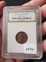 Front view of 1934 Lincoln Wheat Penny in slab showing obverse with Lincoln's profile and date