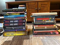 Stack of books including Quantum Success, Animal Spirit Guides, Metaphysical Anatomy, Leadership and the New Science, Adventures of the Soul