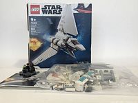 LEGO Star Wars Imperial Shuttle original box with instruction booklet and plastic bags of building pieces displayed on white background