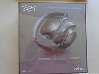 Front view of packaged Veho ZB7 wireless noise cancelling headphones showing product image and key features.