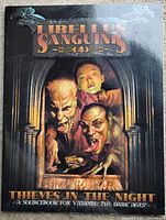 Front cover of the gaming book showing vampire characters and title.