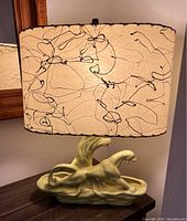 Full view of lamp showing base, shade, wiring, and overall proportions