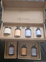 Set of Prose custom hair care products in original box with multiple bottles and jar