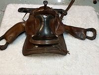 Top-front view showing saddle seat, pommel, cantle, and attached stirrups