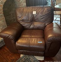 Front view of brown leather recliner