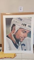 Full view of the signed unframed print of Doug Gilmour hockey portrait showing detailed facial expression and helmet.
