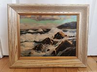 Full frontal view of the framed seascape painting showing overall condition and presentation