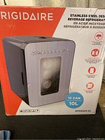 Front view of the Frigidaire beverage refrigerator box showing the product image, logo, and capacity details.