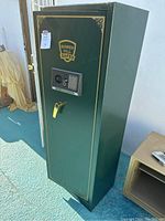 Full front view of green safe showing overall appearance and dimensions