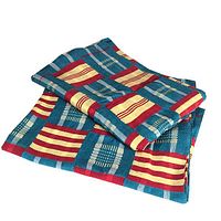 Folded pair of African woven textiles showing vibrant square patterned fabric with red, yellow, and teal blue colors
