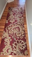 Top view of the floor runner rug highlighting the floral pattern and colors.