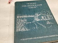 Front cover of a hardcover book titled 'WHERE THE REDWILLOW GREW' with a scenic embossing and subtitle 'Valleyview and Surrounding Districts'