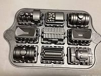 Top view of the pan showing detailed mold for train locomotive, tender, and different train cars.