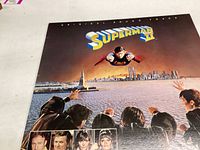 Front cover displaying Superman II movie artwork with Superman flying over city and four characters at bottom edge.