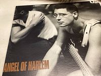 Front cover of the vinyl record showing band member playing guitar