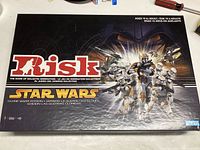 Star Wars Risk Clone Wars Edition box showing the front cover with themed artwork and logos.