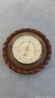 Full view of the Tycos nautical barometer with wood and brass