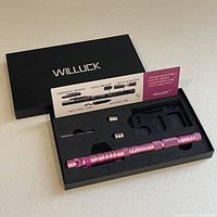 Top down view of the survival tool set inside black case, showing analytic diagram of features on a card insert