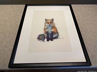 Framed fox print showing full framed artwork on flat surface.