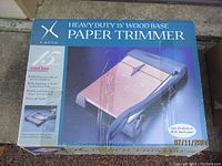 Box of X-Acto Heavy Duty 15" Wood Base Paper Trimmer showing product image and features