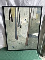 Frontal view of original abstract oil painting, showing composition of tree-like vertical shapes on a muted color background, in a black wooden frame.
