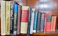Shelf of hardcover books mainly on historical topics and general reference including titles about Western civilization, European civilization, world atlas, and an encyclopedia.