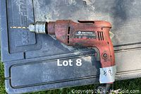 Full view of the King Canada hammer drill showing overall condition and drill bit installed.