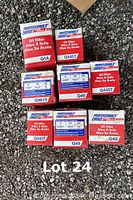 Photo of eight new oil filters in original boxes from Professional's Choice, showing assorted sizes and model numbers.