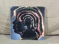 Front cover of Hot Rocks 1964-1971 LP showing multicolor profile silhouette artwork