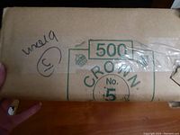 Close-up of wrapped bundle showing '500 Crown No 5' printed on Kraft paper package.