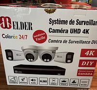 Front of box showing Elder branding, 4K UHD cameras and DVR illustration, colour 24/7, DIY installation