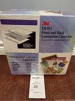 Box packaging of 3M DL951 front and back lamination cartridge with product details and usage examples.
