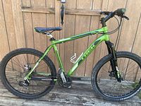 Side view of full bike showing frame, tires and drivetrain