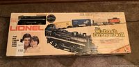Box front showing Lionel Wabash Cannonball electric train set with artwork and visible locomotive through window.