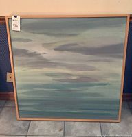 Front view of full painting in wooden frame with MaxSold lot sticker