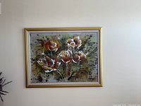 Large floral painting with white flowers and textured paint, framed in gold