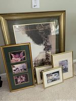 Five framed art prints grouped together against a wall, showing sizes and framing details.