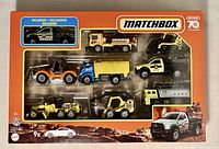 Package view showing all nine die cast vehicles in set.