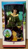 Front view of boxed Ken doll dressed as Scarecrow, showing detailed costume and packaging design.